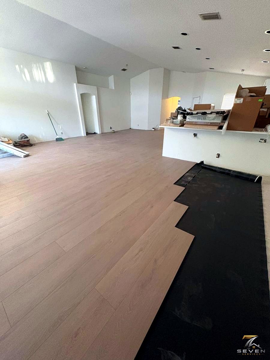 Luxury vinyl plank flooring installation by Seven Services